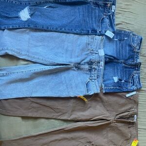 Stylish girls jeans, pants and pair of shorts